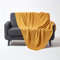 HOMESCAPES Luxury Mustard Knitted Throw Large Cable Knit Cotton Blanket Hand Knit Warm and Cosy Dark Yellow 100% Cotton Textured Diamond Pattern Sofa and Bed Throw, 150 x 200 cm