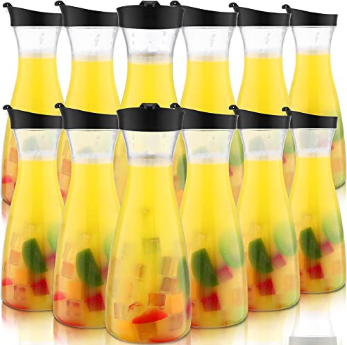 Xinnun 12 Pcs Water Carafe with Flip Top Lid Plastic Carafe with Black Lid Clear Plastic Water or Juice Beverage Pitcher Jug for Restaurant Party School Bar Juice Milk Coffee (35 oz)