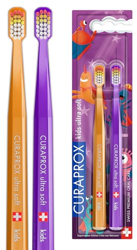 Curaprox Kinderzahnbürste Duo Superheroes Edition 2024 (Orange, Lila)