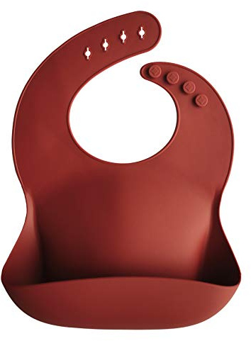 mushie Babero de Silicona para Bebés | Baberos de Alimentación con Bolsillo | 4 Tamaños Ajustables | Accesorio Durable para Niños Pequeños y Niñas | Raw Sienna