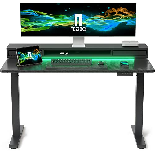 FEZIBO 120 * 60cm Electric Standing Desk with Monitor Stand, Height Adjustable Table with LED Strips, Ergonomic Home Office Furniture with 2 Drawers Storage Gaming Workstation, Black Carbon Fiber