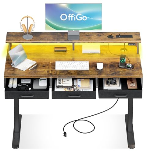 OffiGo Electric Standing Desk, 120 x 54cm Height Adjustable Desk with 3 Drawers, RGB LED Strip & Charging Station for Home Office Computer Workstation, Computer Table with Monitor Stand, Rustic Brown