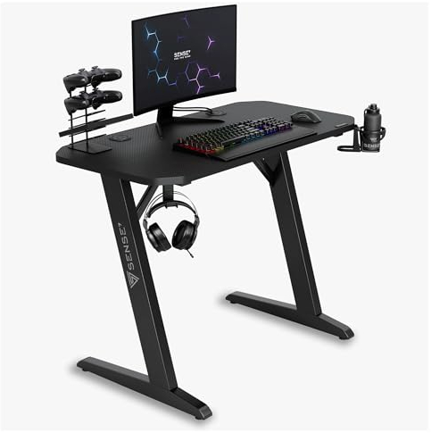 SENSE7 Schreibtisch Nomad Basic, Gaming Tisch 120x60, PC Tisch mit Kopfhörerhaken, Getränkehalter, Controller Halter, Gaming Computertisch mit Kohlefaseroberfläche, Ergonomischer Gaming Desk