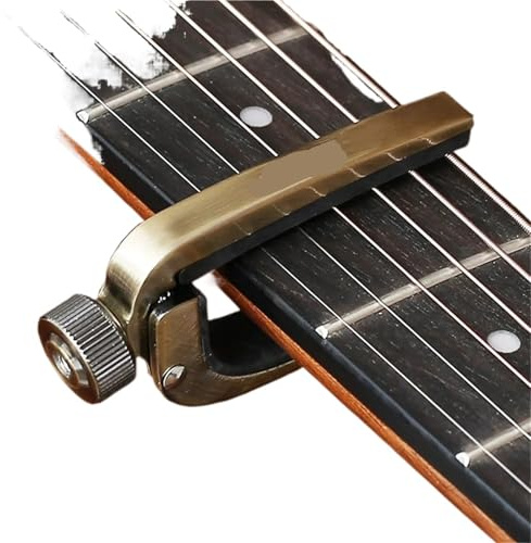 Kapodaster för gitarr gitarrkapodaster, justerbar metallrulle, perfekt snabb stämningsförändring för elektrisk akustisk gitarr, bas, violin och ukulele (gul)