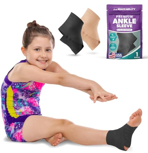 BraceAbility Elastic Ankle Support Brace - Youth Slip on Foot and Ankle Compression Sleeve for Gymnastics, Dance, Kids, Sports, Running, and Sprained Ankle Swelling for Boys and Girls (S - Black)