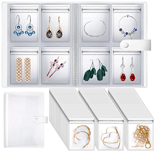 Heveer Libro de Almacenamiento de Joyas Transparente 160 Rejillas con 100 Piezas de Bolsa Organizador de Joyas Portátil Joyas Bolsas Viaje para Collares Pulseras Pendientes