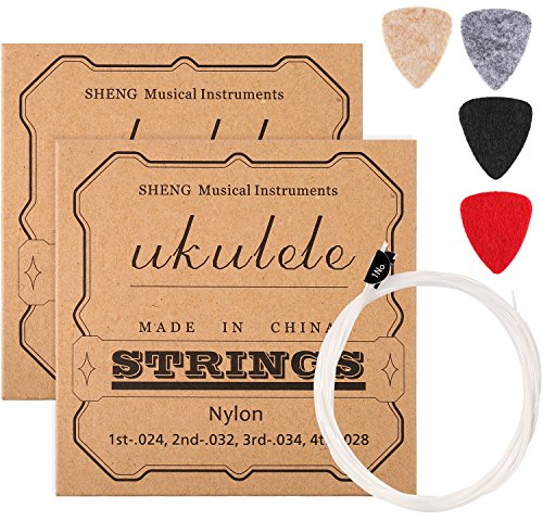 2 Sets von Nylon Ukulele Saiten mit 4 Filz Picks, Saiten sind Weiß, Picks sind Gelb, Grau, Schwarz, Rot