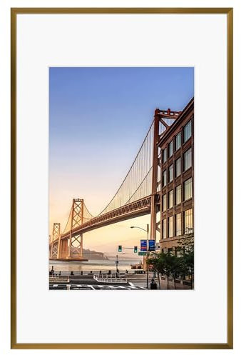 Frametory, 11x17 Aluminum Picture Frame - 11x17 Bronze Frame with Removable Mat for 8x12 Photo - 17x11 Durable Metal Frame with Real Glass - Sawtooth Hanger for Easy Wall Display - 1 Pack