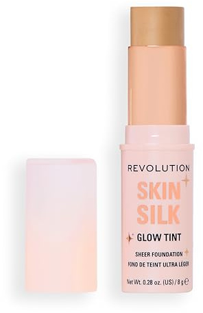 Revolution Skin Silk Glow Tint Barra de Base Ligera – Piel Radiante, Disimula Imperfecciones y Suaviza Líneas Finas, Medium Tan Warm, 8g