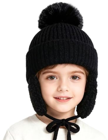 XNDZ Gorro cálido de invierno con orejeras para niños y niñas, forro polar grueso, pompón, gorro para esquí, deportes de nieve, Negro, 3-12 Years