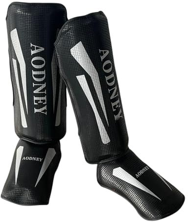 Oshhni Muay Thai Kickboxen Schienbeinschoner Bein Fußschützer Boxausrüstung MMA Bein Spann Schutzpolster für Taekwondo Boxen Kicking, Black M