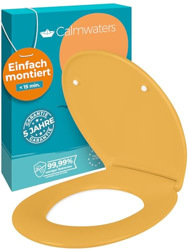 Calmwaters® Premium WC Sitz einfache Montage, Toilettendeckel bis 250 kg, Made in EU, antibakterieller Duroplast, Absenkautomatik, 2 Montage Optionen, abnehmbar, Klobrille, oval, Curry-Gelb