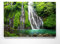 Atemberaubendes Leinwandbild Wald im XXL Format 120x80cm. Das Motiv Tropischer Wasserfall als großes Wandbild. Fertig aufgespannt auf Holzrahmen. Als Hintergrund und Deko für Wohnzimmer & Schlafzimmer