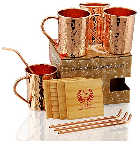 Gift Set Pure Copper Hammered Mugs with Copper Straws & Wooden Coasters Set of 4 - PREMIUM QUALITY -16 Oz Copper Mug - 100% Handcrafted - A Gift Pack for your loved Ones.