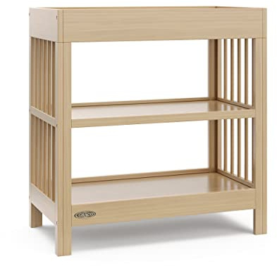Graco Teddi Changing Table with Water-Resistant Changing Pad (Driftwood) - GREENGUARD Gold Certified, Includes Bonus Water-Resistant Changing Pad with Safety Strap, 2 Shelves, Easy-to-Match