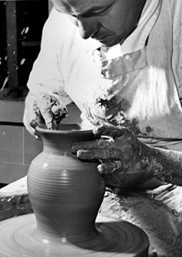 Potter working on a pottery wheel Poster Print (24 x 36)