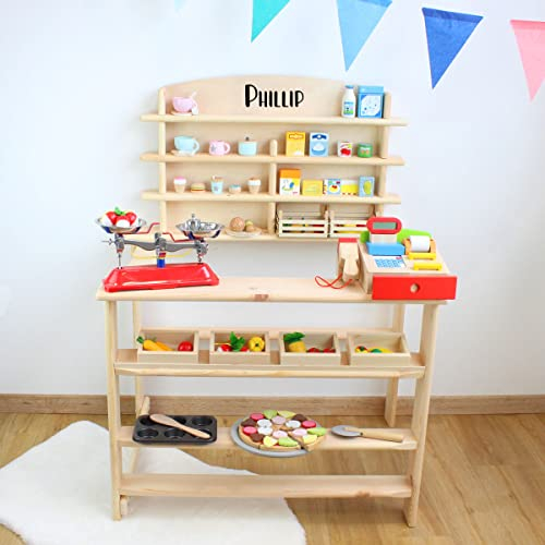 Großer Kaufmannsladen aus Holz mit Ladenschild