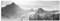 Leinwandfoto als Panorama SCHWARZ/WEISS 150x50cm Berge Wald Schnee Wolken Sonnenstrahlen