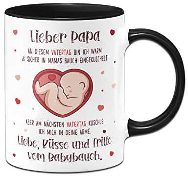 Tassenbrennerei Keramik, Tasse - Lieber Papa diesen Vatertag bin ich noch in Mamas Bauch - Kaffeetasse mit Spruch als Geschenkfür werdenden Vater (Schwarz)
