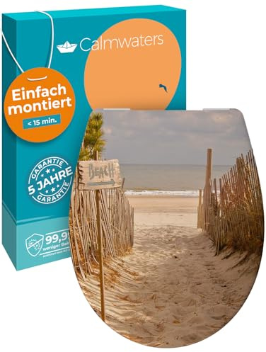 Calmwaters® WC Sitz Motiv Sandstrand einfache Montage, Toilettendeckel bis 250 kg, Made in EU, antibakterieller Duroplast, Absenkautomatik, 2 Montage Optionen, abnehmbar, Klobrille, oval