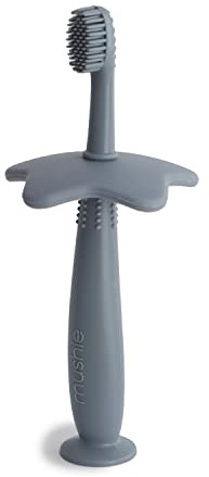 Mushie Silicone Toothbrush for Infants & Toddlers | Suction Base for Easy Storage & Training | Food Grade Silicone | Star Design (Tradewinds)
