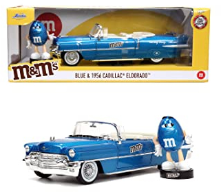 Jada Toys M&Ms Figur Blue mit 1956er Cadillac Eldorado - Spielzeug-Set aus Modellauto und Blauer M&M`s Figur, dekorativer Fanartikel aus Metall für Sammler & Schokoladen-Liebhaber, 18 cm