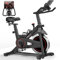 CURSOR FITNESS Heimfahrrad für Zuhause, Stilles Fitnessbike mit Einstellbarem Widerstand, Verstellbarem Lenker und Sattel, LCD-Display, Atmungsaktiven Sitzpolstern, für Cardio-Training