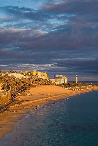 ArtExpert Canary Islands-Fuerteventura Island-Morro Jable-high angle view of Playa de la Cebada beach-sunset by Walter Bibikow - 16x24 Art Print Poster