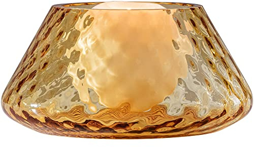 Porta candela di Venini della collezione Lele. Realizzato in vetro con candela sferica inodore di colore ambra. Le dimensioni sono: diam. 18 cm, H. 9 cm. La referenza è 100.73LELEAM.