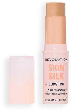 Revolution Skin Silk Glow Tint Barra de Base Ligera – Piel Radiante, Disimula Imperfecciones y Suaviza Líneas Finas, Tono Medium Neutral, 8g