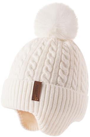 FENELY Girls Boys Winter Hat for 3-12 Years, Children's Warm Knitted Earflaps Beanie with Pom Pom Thicken Fleece Lining Cap for Kids White