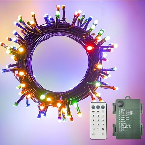 GHJ Guirlande lumineuse à piles télécommandée, 50/100/200 LED changeantes de couleur (blanc chaud/multicolore) sur câble vert foncé – pour sapins de Noël, fêtes, maison, jardin (50LED-5M)