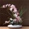 SYDDOL 17 Künstliche Orchideen im Topf, dekorativer Orchideen-Bonsai mit Real-Touch-Technologie, künstliche/falsche Orchideen, die echt Aussehen, für Tischdekorationen (Pink Blume und Weißer Topf)
