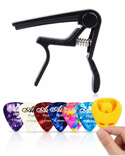 YIPFEN Cejilla Guitarra Negra 1 unidad Plástico, +6 Púas. Capo Universal para Guitarra Acústica, Eléctrica, Ukelele. Permite Cambio Rápido y Afinación Precisa; protege mástil y cuerdas.