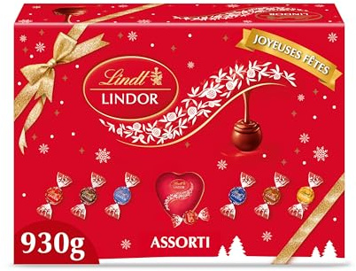 Lindt - Boîte Cadeau LINDOR - Fourreau Noël - Assortiment de Chocolat au Lait, Noir 45%, Blanc, Noisette, Cœur Blanc, Double Chocolat - Cœur Fondant, 930g