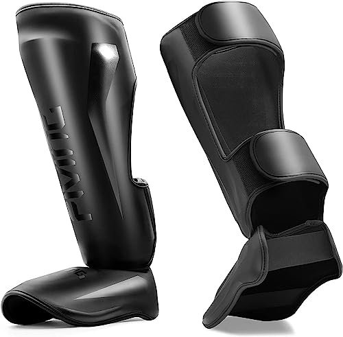 FIVING MMA Kampfsport Schienbeinschützer – gepolsterte, verstellbare Thai Boxschienbeinschützer, mit Spannschutz, geeignet für Taekwondo/Mixed Kampfsport Training und Sparring (Schwarz, L)