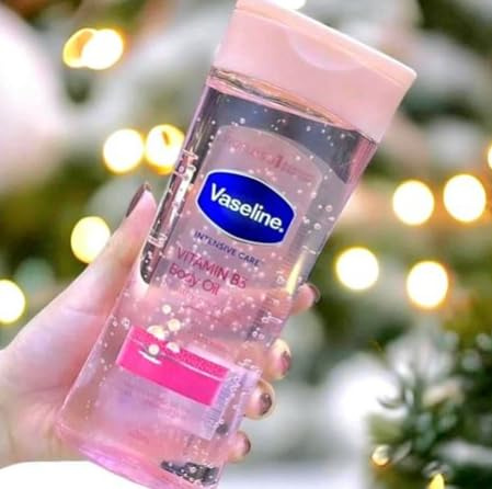 Vaseline Intensive Care Body Oil à la Vitamine B3 – Huile Hydratante pour Peaux Sèches et Ternes, Absorption Rapide, Fini Non Gras, 200 ml
