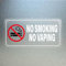 YIKIADA Lot de 10 panneaux en vinyle autocollant « No Smoking No Vaping » 10 x 5 cm - Panneau d'avertissement d'interdiction de fumer - Panneau d'interdiction de fumer - Pour usage extérieur et intér