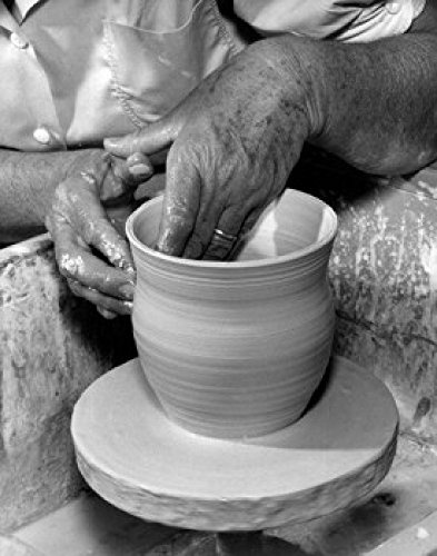 Potter working on a pottery wheel Poster Print (18 x 24)