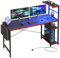 Bestier 155CM Corner Desk with Power Outlets Large Computer Desk with LED Lights Reversible Writing Table with Side Pocket Storage Bag & Accessories Hanger for Home Office