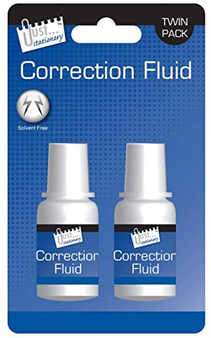 3 botellas de líquido corrector.