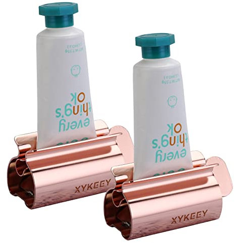 XYKEEY Toothpaste Tube Squeezer - Set of 2 Toothpaste Squeezer Rollers, Metal Toothpaste Tube Wringer Seat Holder Stand (Coral)
