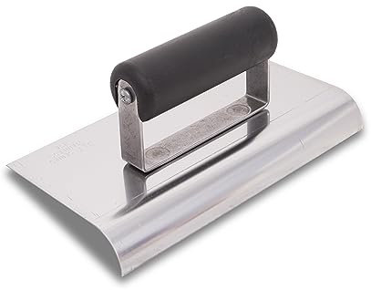 La paleta de borde de Marshalltown, de acero inoxidable con mango de plástico, permite redondear el hormigón, radio: 13 mm, labio: 16 mm, dimensiones: 229x64 mm.