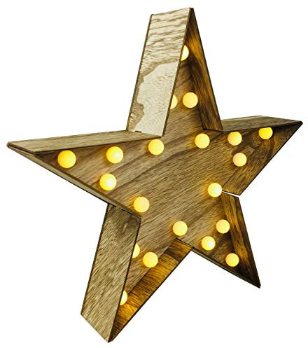 Heaven skickar ljus upp stj�rna � f�rbelyst jul eller heminredning