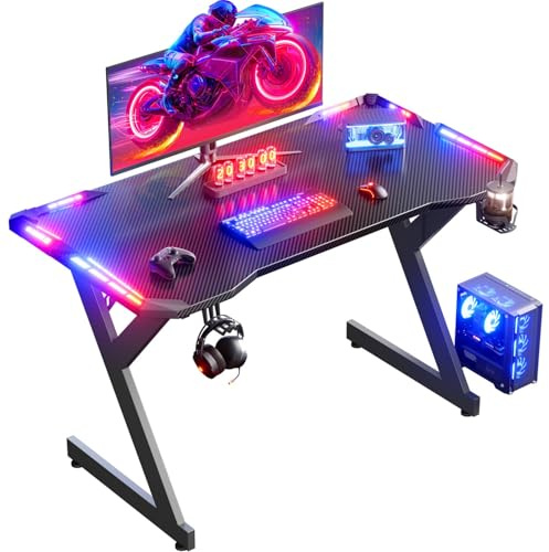 HLFURNIEU Scrivania Gaming LED 100 x 60 cm, Scrivania Gamer con Piano in Fibra di Carbonio, Postazione Gaming Ergonomico con Porta Bicchiere e Gancio per Casco, Tavolo Computer Nero
