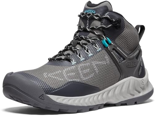 KEEN Women's NXIS Evo Mid Height Waterproof Fast Packing Hiking Boots, Magnet/Ipanema, 5