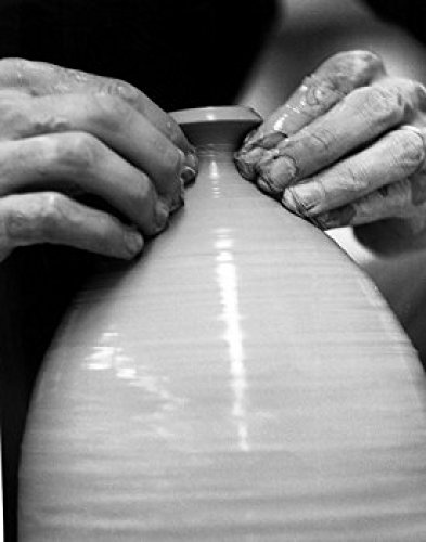 Potter working on a pottery wheel Poster Print (18 x 24)