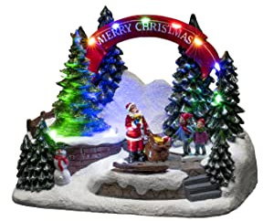 Konstsmide LED Szenerie Santa und Kinder, mit Musik, wählbare Energiefunktion, 11 bunte Dioden, batteriebetrieben, Innen, 3 x AA 1.5V (exkl.) - 4244-000
