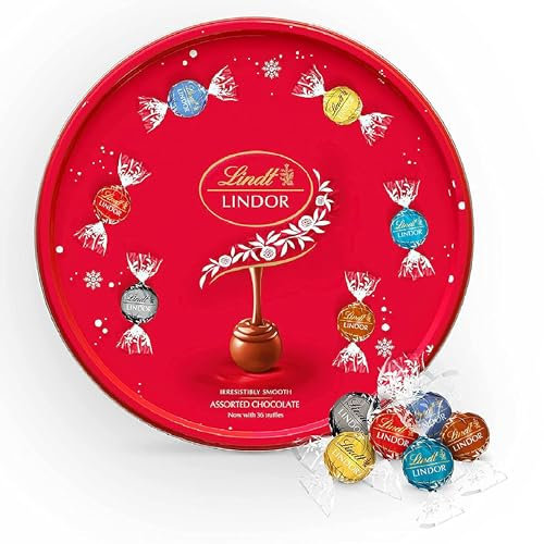 Assorted Lindt Chocolates Gift Tin - Irresistible Smooth Selection of Milk, White & Dark Chocolate Truffles Tin 450g with Christmas Tree Decoration. Christmas Gifts for Women or Secret Santa Gifts