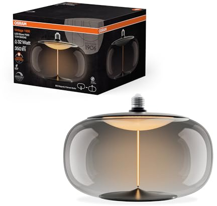 Osram Vintage 1906 Big Elipse ist eine dimmbare LED-Lampe aus Kunststoff mit Filament in Ellipsenform. Sie bietet 12 W für 350 lm, E27 Fassung, Smoke Design, 300 mm Durchmesser, CRI 80, 1800 K.